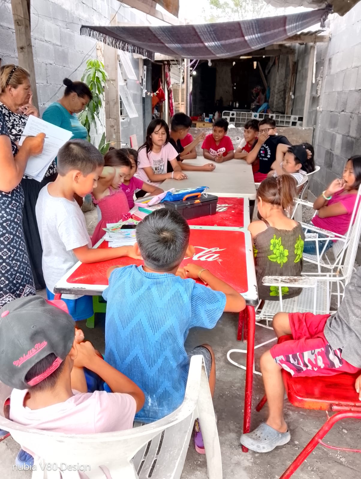 A local pastor and his wife leading children's ministry